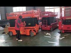 Elektryczny napęd 12-metrowy samobieżny podnośnik nożyczkowy o rozmiarze platformy 2,27m x 1,12m